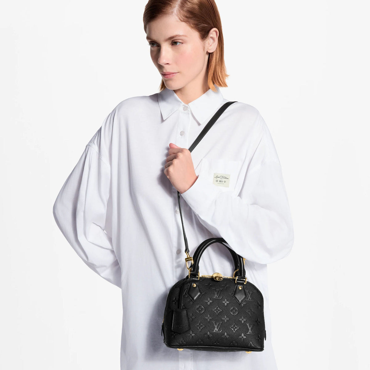 Women's Alma BB Monogram Empreinte Leather Handbag M26409