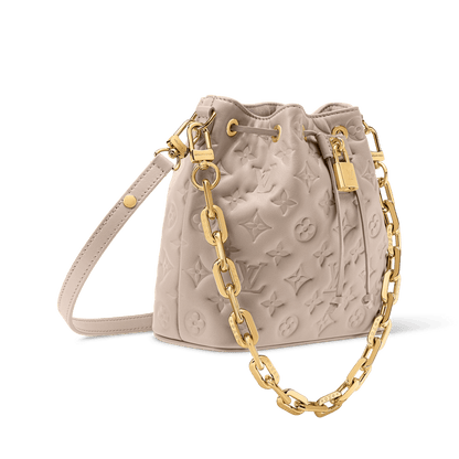 Women's Coussin Bucket Monogram Embossed Lambskin Drawstring Bag M26530