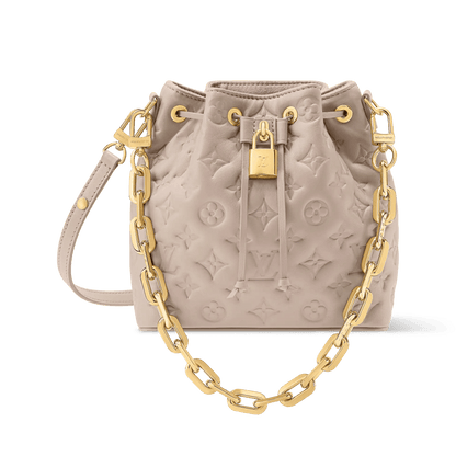 Women's Coussin Bucket Monogram Embossed Lambskin Drawstring Bag M26530